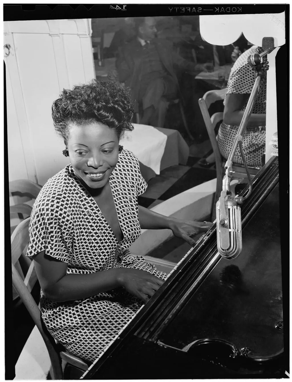 Archive image: Gottlieb, William P., 1917-, photographer. [Portrait of Mary Lou Williams, New York, N.Y., ca. 1946] 1 negative : b&w ; 3 1/4 x 4 1/4 in. Notes: Gottlieb Collection Assignment No. 335 Reference print available in Music Division, Library of Congress. Purchase William P. Gottlieb Forms part of: Willia
