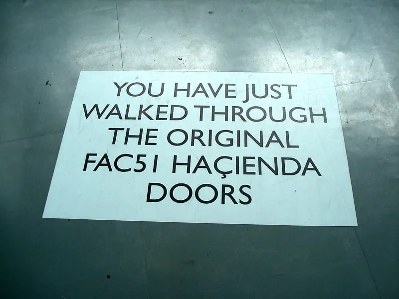 A metal floor sign in Manchester identifying the former location of the Haçienda nightclub and its Factory catalog number FAC 51.