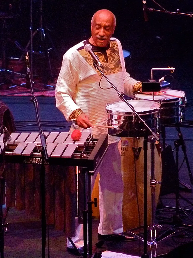 Mulatu Astatke performs on vibraphone with percussionist and ensemble members of the Heliocentrics at the Barbican.