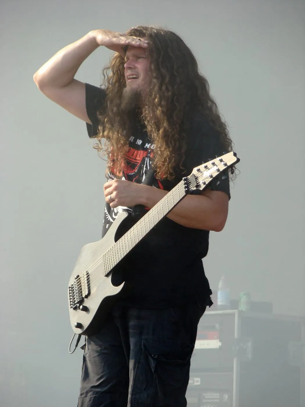 Marten Hagstrom playing an extended-range electric guitar during a Meshuggah performance in 2008.