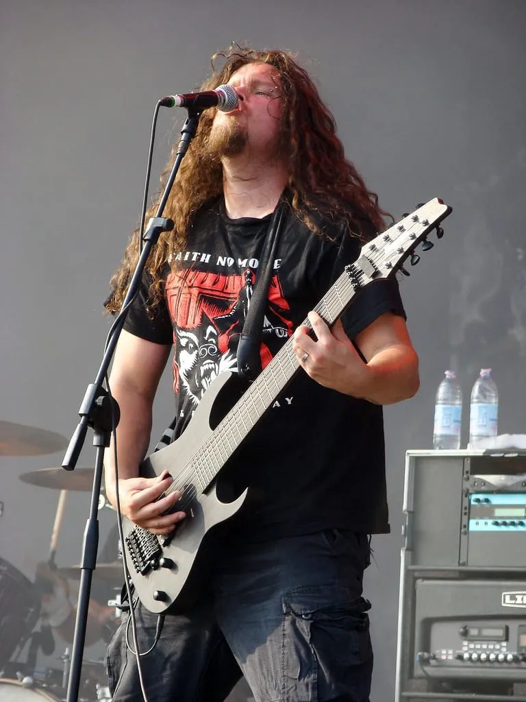 Marten Hagstrom standing with his guitar during a Meshuggah stage performance in 2008.