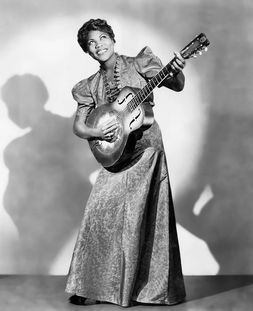 Archive image: Publicity photo of American musician Sister Rosetta Tharpe posed with a guitar in 1938.