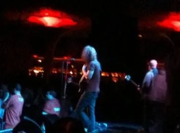 Soundgarden performing on a brightly lit stage during the band's reunion concert in April 2010.