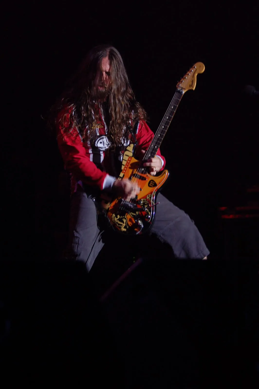 Andreas Kisser playing guitar with Sepultura at the Metalmania festival in 2007.
